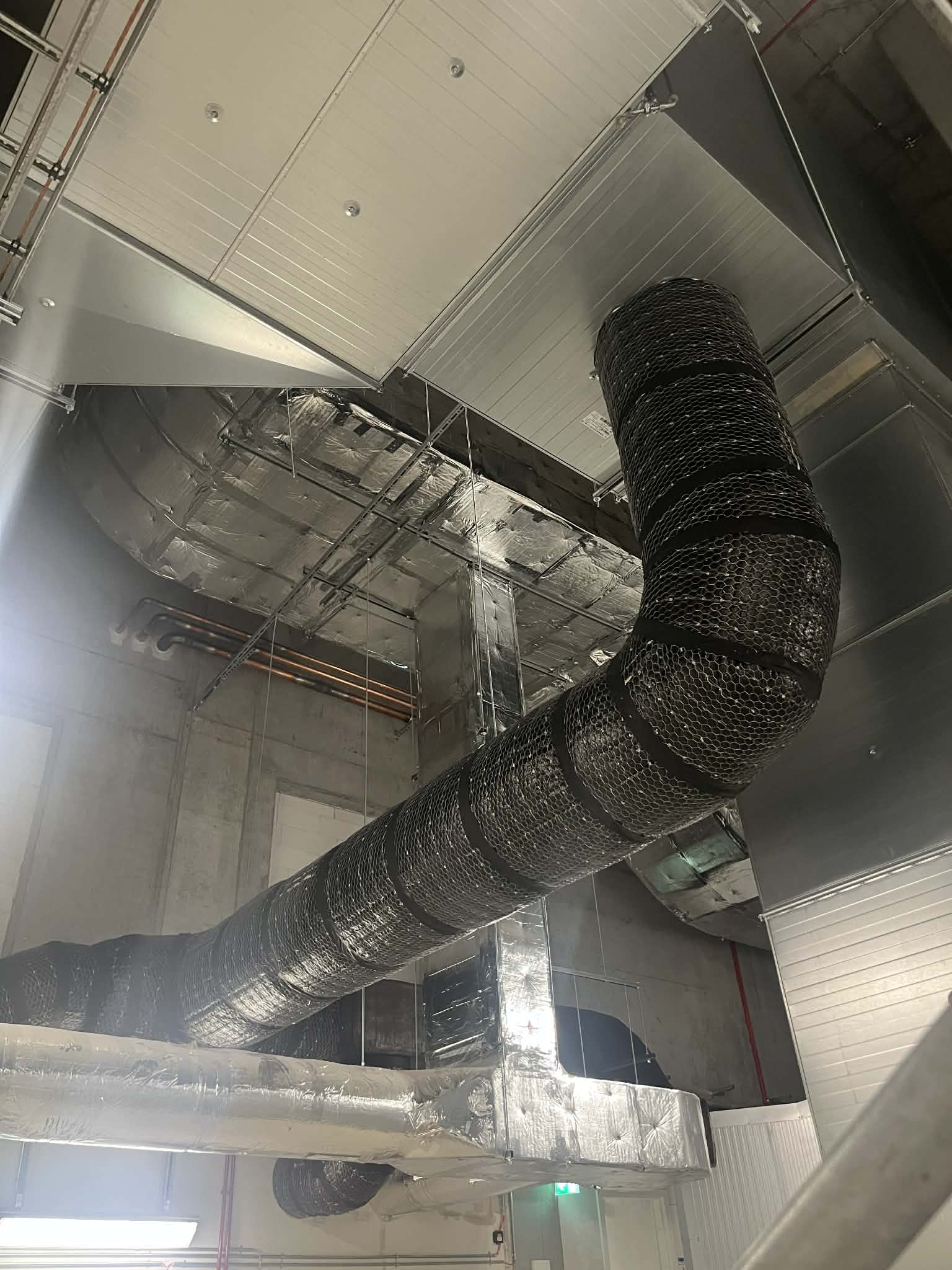 Ventilationsisolering af ventilationskanaler i erhvervsbyggeri